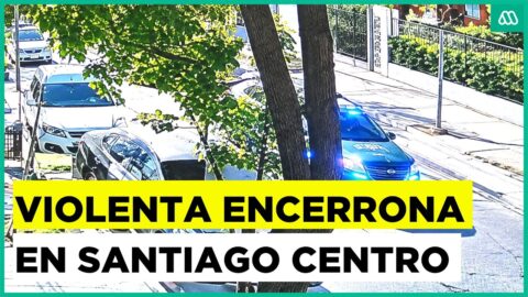 Encerrona armada en pleno centro de Santiago y fuga con vehículo