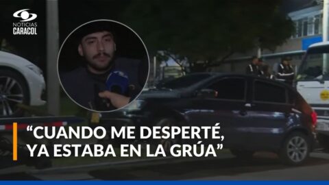 Estudiante es trasladado en grúa mientras dormía en su carro en Bogotá