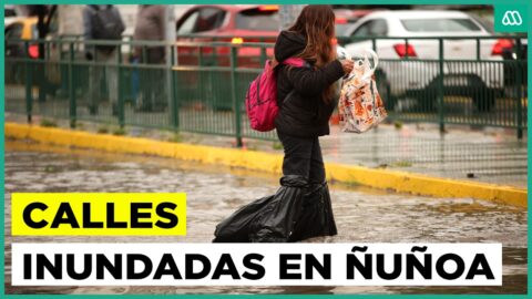 Lluvias anegan calles de Ñuñoa e Irarrázaval en Santiago